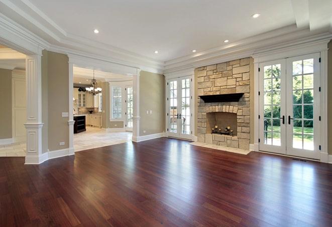 brightly lit room with shiny hardwood floors